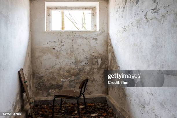 old prison cell in an abandoned building - narrow stock pictures, royalty-free photos & images