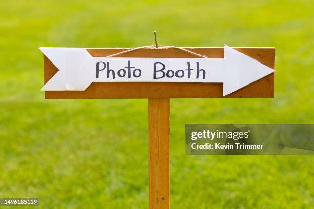 photo booth this way! - photo booth sign stock pictures, royalty-free photos & images