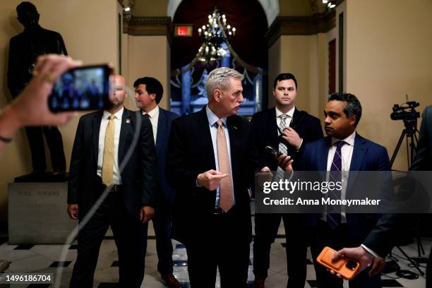 Speaker of the House Kevin McCarthy speaks to CNN's Manu Raju as he walks to the House Chambers to open up the legislative session in the U.S....