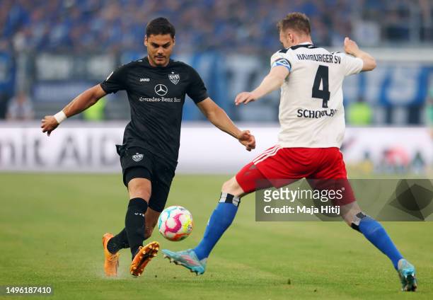 Konstantinos Mavropanos of VfB Stuttgart battles for possession with Sebastian Schonlau of Hamburger SV during the Bundesliga playoffs second leg...