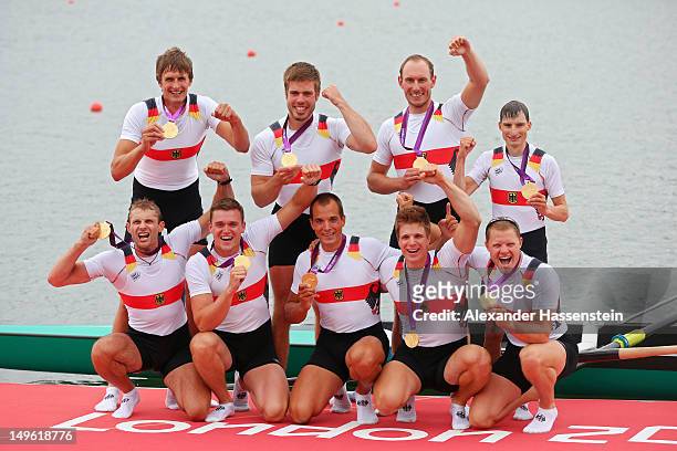 The Germany team members celebrate with their medals after winning gold in the Men's Eight Final on Day 5 of the London 2012 Olympic Games at Eton...