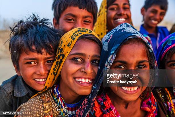 group of happy gypsy indian children, desert village, india - local gypsy stock pictures, royalty-free photos & images