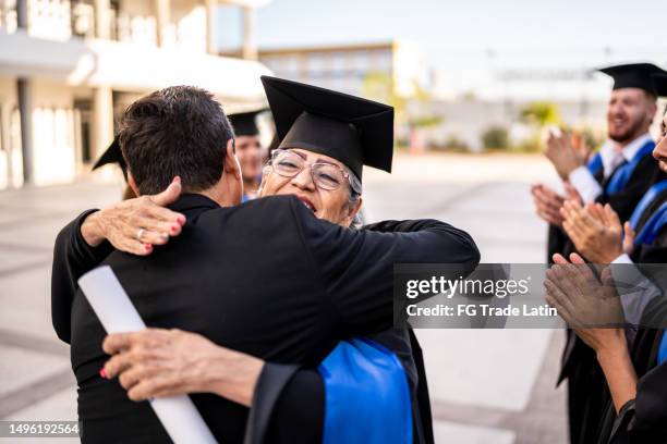 Graduation Received 2,836 Graduation Receiving Diploma Stock Photos, High-Res Pictures, and ...