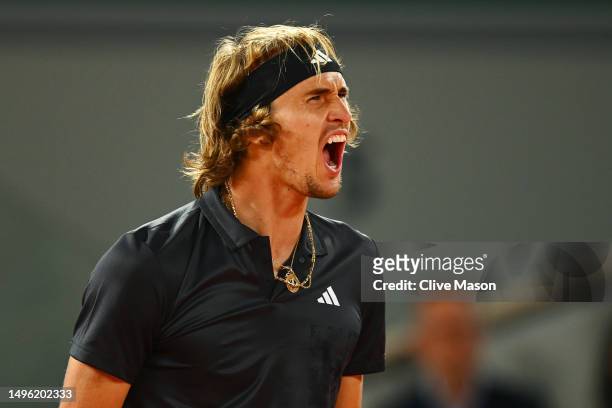 Alexander Zverev of Germany celebrates winning match point against Grigor Dimitrov of Bulgaria during the Men's Singles Fourth Round match on Day...
