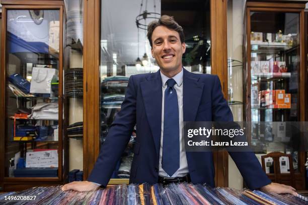 Alessandro Marinella, fourth generation of the Marinella family, poses for a photograph inside the historic Marinella store wearing a Scudetto...