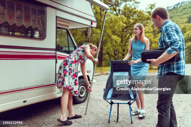 People Around Rv 69 Man Pulling Caravan Stock Photos, High-Res Pictures, and Images ...