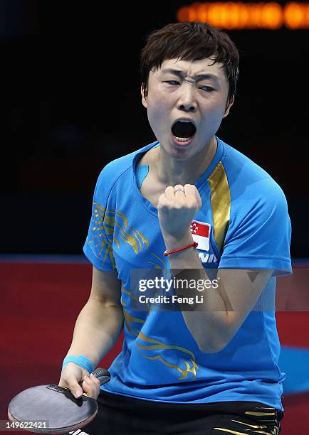 Tianwei Feng of Singapore celebrates a point during her Women's Singles Table Tennis Bronze Medal match against Kasumi Ishikawa of Japan on Day 5 of...