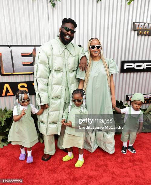 Tobe Nwigwe poses with his family at Paramount's "Transformers: Rise Of The Beasts" New York Premiere at Kings Theatre on June 05, 2023 in New York...