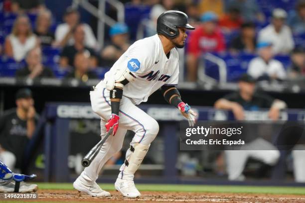 Luis Arraez of the Miami Marlins hits an RBI single in the fourth inning against the Kansas City Royals at loanDepot park on June 05, 2023 in Miami,...