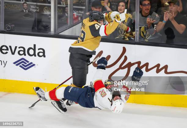 Ivan Barbashev of the Vegas Golden Knights hits Radko Gudas of the Florida Panthers during the first period in Game Two of the 2023 NHL Stanley Cup...