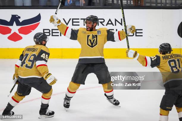 Alec Martinez of the Vegas Golden Knights celebrates with teammates after scoring a goal during the first period against the Florida Panthers in Game...