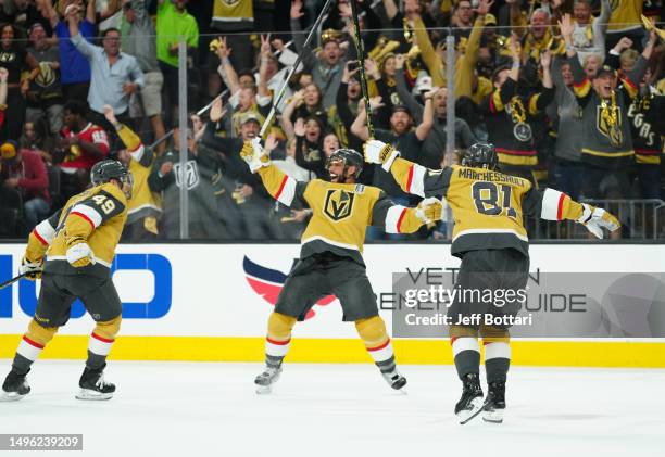 Alec Martinez of the Vegas Golden Knights celebrates with teammates after scoring a goal during the first period against the Florida Panthers in Game...