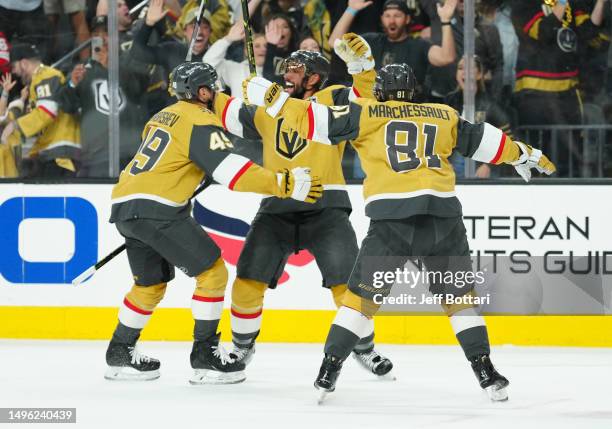 Alec Martinez of the Vegas Golden Knights celebrates with teammates after scoring a goal during the first period against the Florida Panthers in Game...