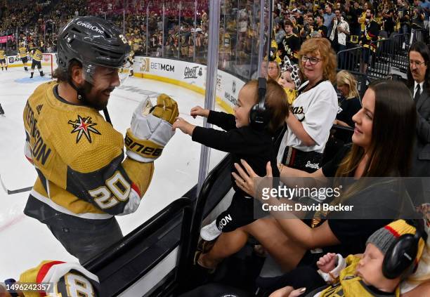 Chandler Stephenson of the Vegas Golden Knights greets his son, Ford Tomis Stephenson, prior to Game Two of the 2023 NHL Stanley Cup Final against...