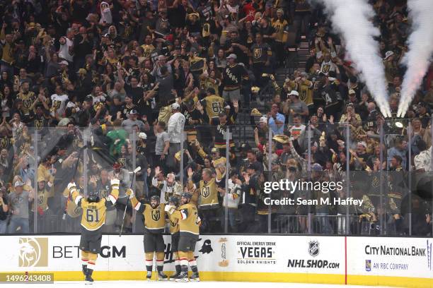 Brett Howden of the Vegas Golden Knights is congratulated by his teammates after scoring a goal against the Florida Panthers during the second period...