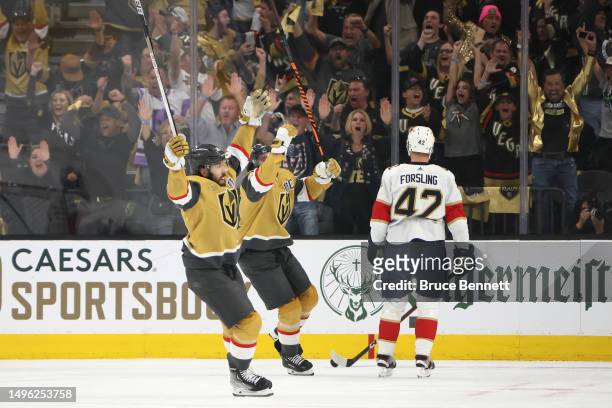 Chandler Stephenson and Mark Stone of the Vegas Golden Knights celebrate a goal by Jonathan Marchessault against the Florida Panthers as Gustav...