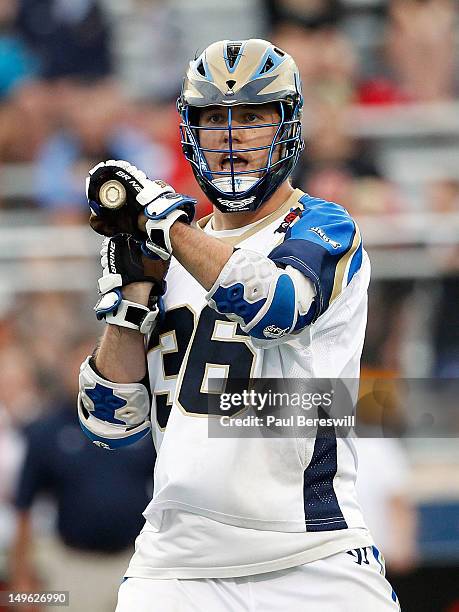 Brian Carroll of the Charlotte Hounds shouts to a teammate he is passing to in the second quarter of a Lacrosse game vs the Long Island Lizards at...