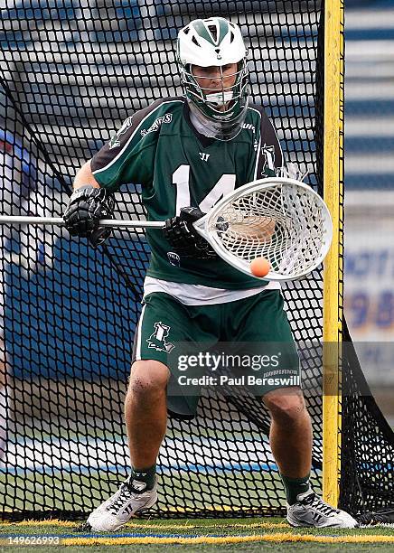 Goalie Drew Adams of the Long Island Lizards makes a save on a shot by the Charlotte Hounds in the second quarter of a Lacrosse game at James M....