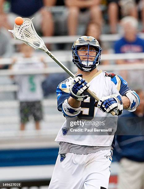 Josh Amidon of the Charlotte Hounds plays a pass in the second quarter of a Lacrosse game vs the Long Island Lizards at James M. Shuart Stadium on...