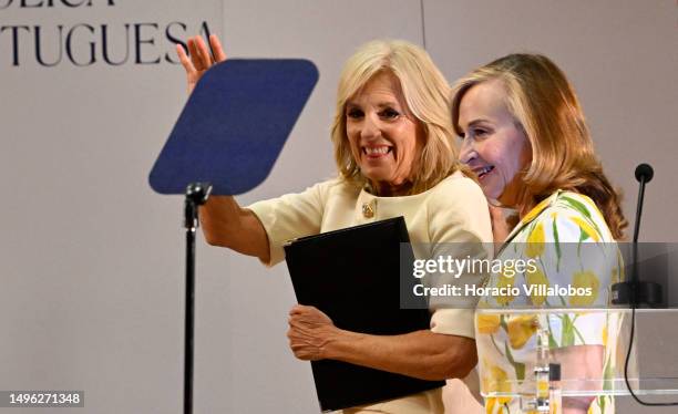 First Lady Jill Biden waves as she walks offstage with U.S. Ambassador Randi Charno Levine after delivering remarks during the launch of the U.S....