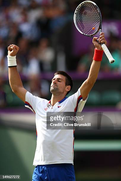Novak Djokovic of Serbia celebrates after defeating Lleyton Hewitt of Australia in the third round of Men's Singles Tennis on Day 5 of the London...