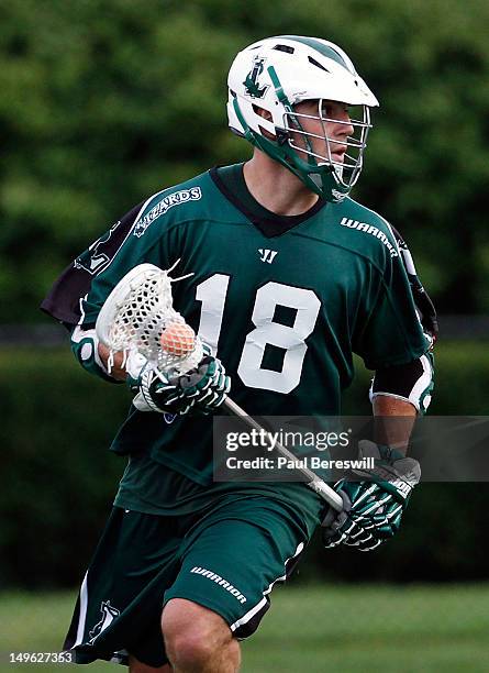 Stephen Peyser of the Long Island Lizards moves with the ball in the second quarter of a Lacrosse game against the Charlotte Hounds at James M....
