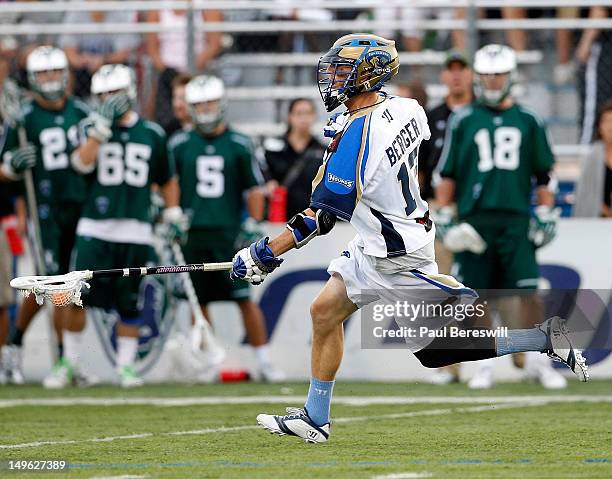 Stephen Berger of the Charlotte Hounds moves the ball against the Long Island Lizards in a Lacrosse game at James M. Shuart Stadium on July 28, 2012...