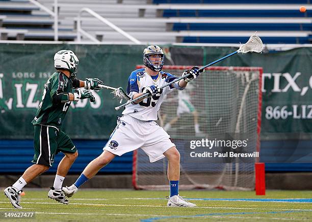 Kevin Ridgway of the Charlotte Hounds releases a pass against the Long Island Lizards in a Lacrosse game at James M. Shuart Stadium on July 28, 2012...