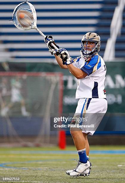 Goalie Adam Ghitelman of the Charlotte Hounds clears the ball against the Long Island Lizards in a Lacrosse game at James M. Shuart Stadium on July...