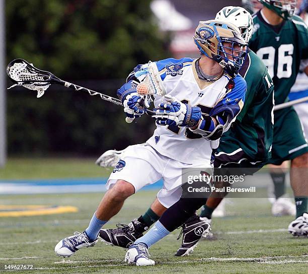 Stephen Berger of the Charlotte Hounds turns with the ball in the second quarter of a Lacrosse game vs the Long Island Lizards at James M. Shuart...
