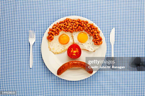 an unhappy fast-food breakfast - engelsk frukost bildbanksfoton och bilder