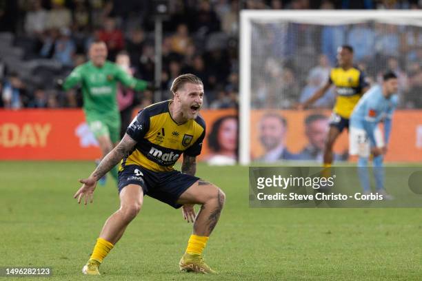 Jason Cummings of the Mariners reacts to winning the match during the 2023 A-League Men's Grand Final match between Melbourne City and Central Coast...