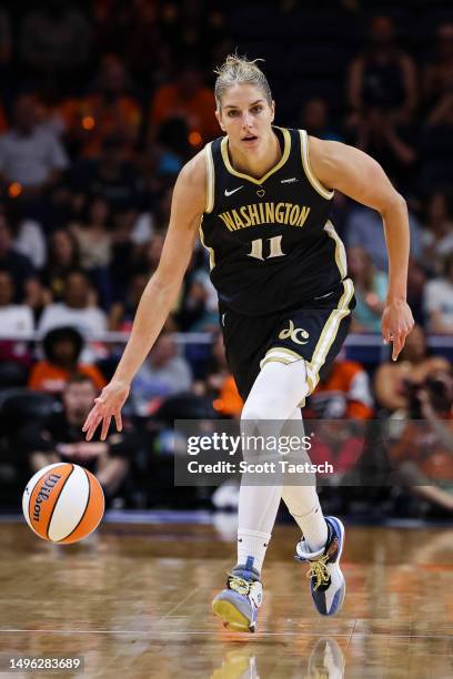 Elena Delle Donne of the Washington Mystics brings the ball up court against the Dallas Wings during the first half of the game at Entertainment &...