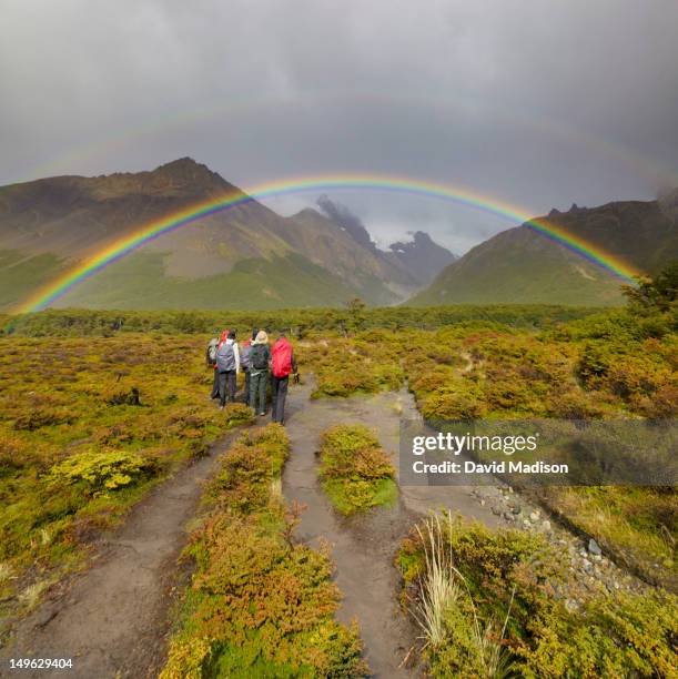 tourists and rainbows near rio blanco, - monte fitz roy fotografías e imágenes de stock