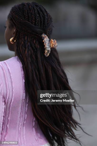 Lois Opoku wearing Chanel canvas beige ballerinas, Chanel pink logo summer cardigan, Louis Vuitton mini Speedy pink shiny bag and Zara silk beige...
