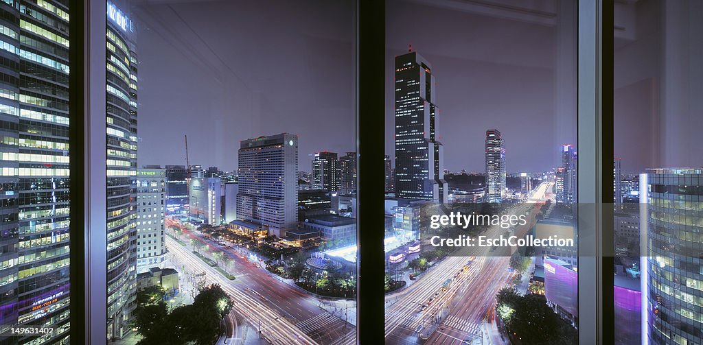 Window view of a busy crossing at Gangnam, Seoul