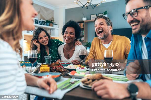 lunch with friends - feast stock pictures, royalty-free photos & images