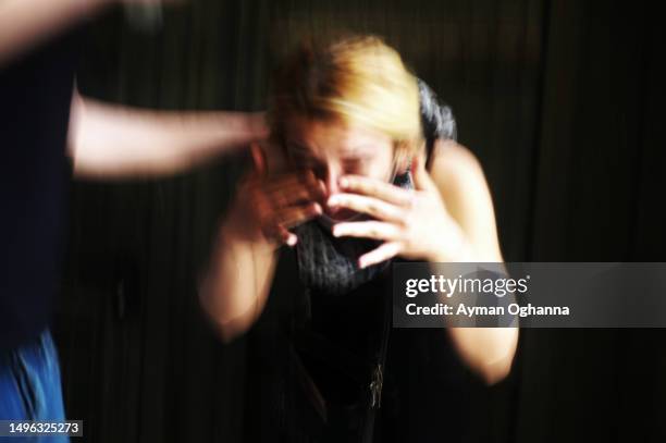 1st: A young woman washes her face after being teargassed by police near Istanbul's Taksim square on June 1st, 2013 in Istanbul, Turkey. The 2013...