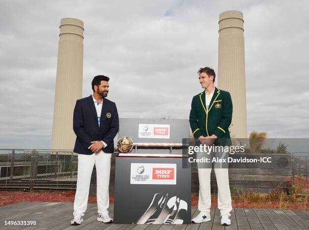 Rohit Sharma, captain of India poses with Pat Cummins, captain of Australia and the ICC World Test Championship mace prior to the ICC World Test...