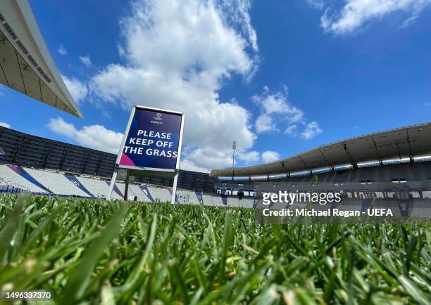 Sign placed near the pitch reads 'PLEASE KEEP OFF THE GRASS' in the Ataturk Olympic Stadium ahead of the UEFA Champions League 2022/23 final on June...