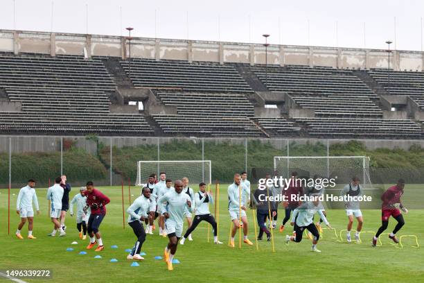 Players of West Ham United warm up during a West Ham United Training Session prior to the UEFA Europa Conference League 2022/23 final match between...