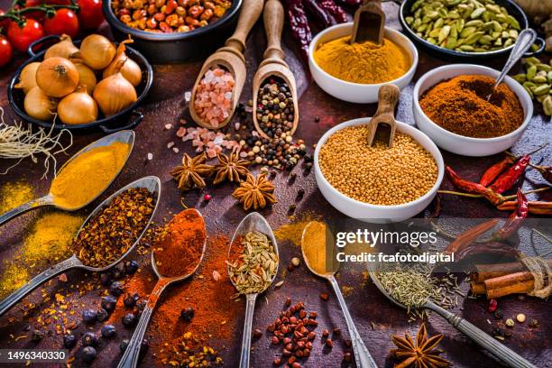 indian food: spices, herbs and condiments background. - indian food stock pictures, royalty-free photos & images