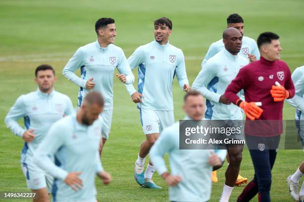 Nayef Aguerd and Lucas Paqueta of West Ham United warm up during a West Ham United Training Session prior to the UEFA Europa Conference League...