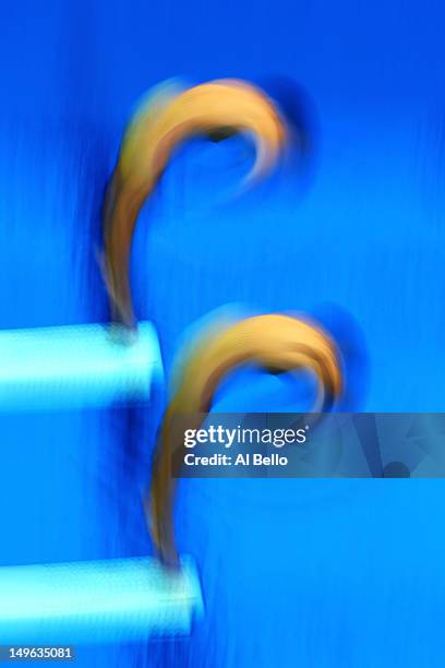 Illya Kvasha and Oleksiy Prygorov of Ukraine competes in the Men's Synchronised 3m Springboard Diving on Day 5 of the London 2012 Olympic Games at...