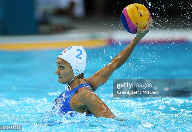 Simona Abbate of Italy passes the ball in the Women's Preliminary Round match between Italy and Russia on Day 5 of the London 2012 Olympics at Water...
