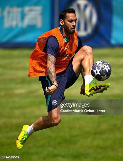 Hakan Calhanoglu of FC Internazionale in action during the FC Internazionale training session at the club's training ground Suning Training Center at...