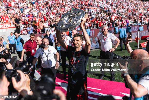 Thomas Mueller of Muenchen celebrates the winning of the championship after the Bundesliga match between 1.FC Koeln and FC Bayern Muenchen at...