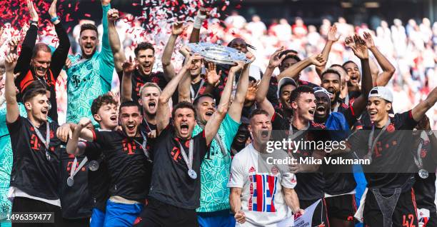 Players of Muenchen, Thomas Mueller, goalkeeper Manuel Neuer, Joshua Kimmich, Jamal Musiala etc. Celebrate the winning of the championship after the...