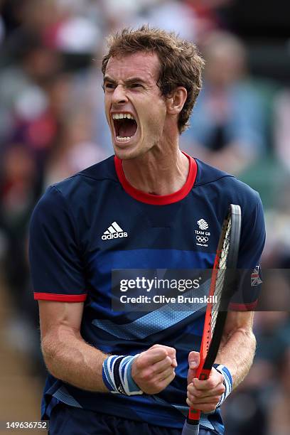 Andy Murray of Great Britain celebrates after defeating Marcos Baghdatis of Cyprus during the third round of Men's Singles Tennis on Day 5 of the...