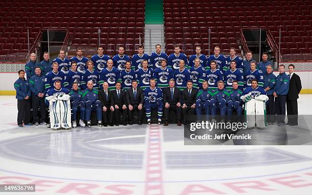 The Vancouver Canucks - Front Row - Cory Schneider, Roland Melanson, Goaltending Coach, Darryl Williams, Assistant Coach, Lorne Henning, Assistant...